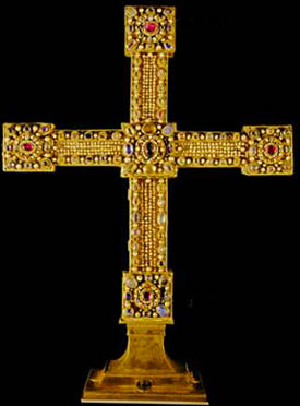 A golden cross studded with jewels